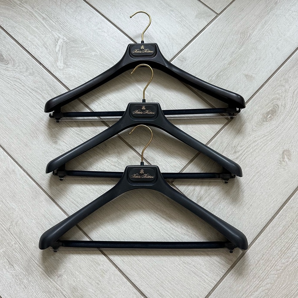 3 Brooks Brothers Suit Hangers, 3 BB Garment Bags, 6 unmarked Suit Hangers.
